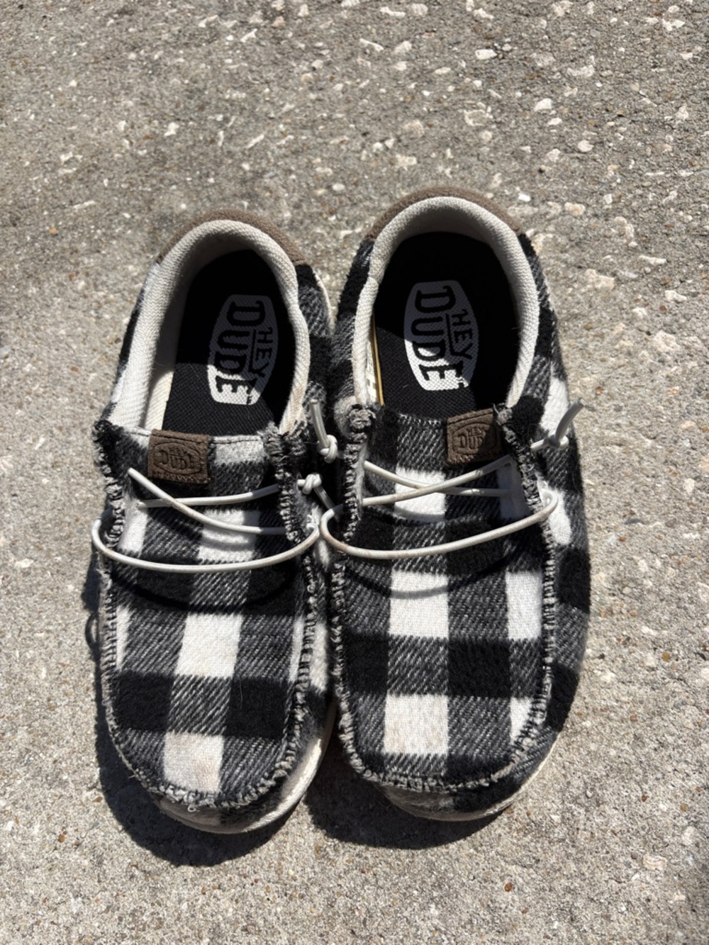 Hey Dude Plaid Slip-On Shoes in Black and White